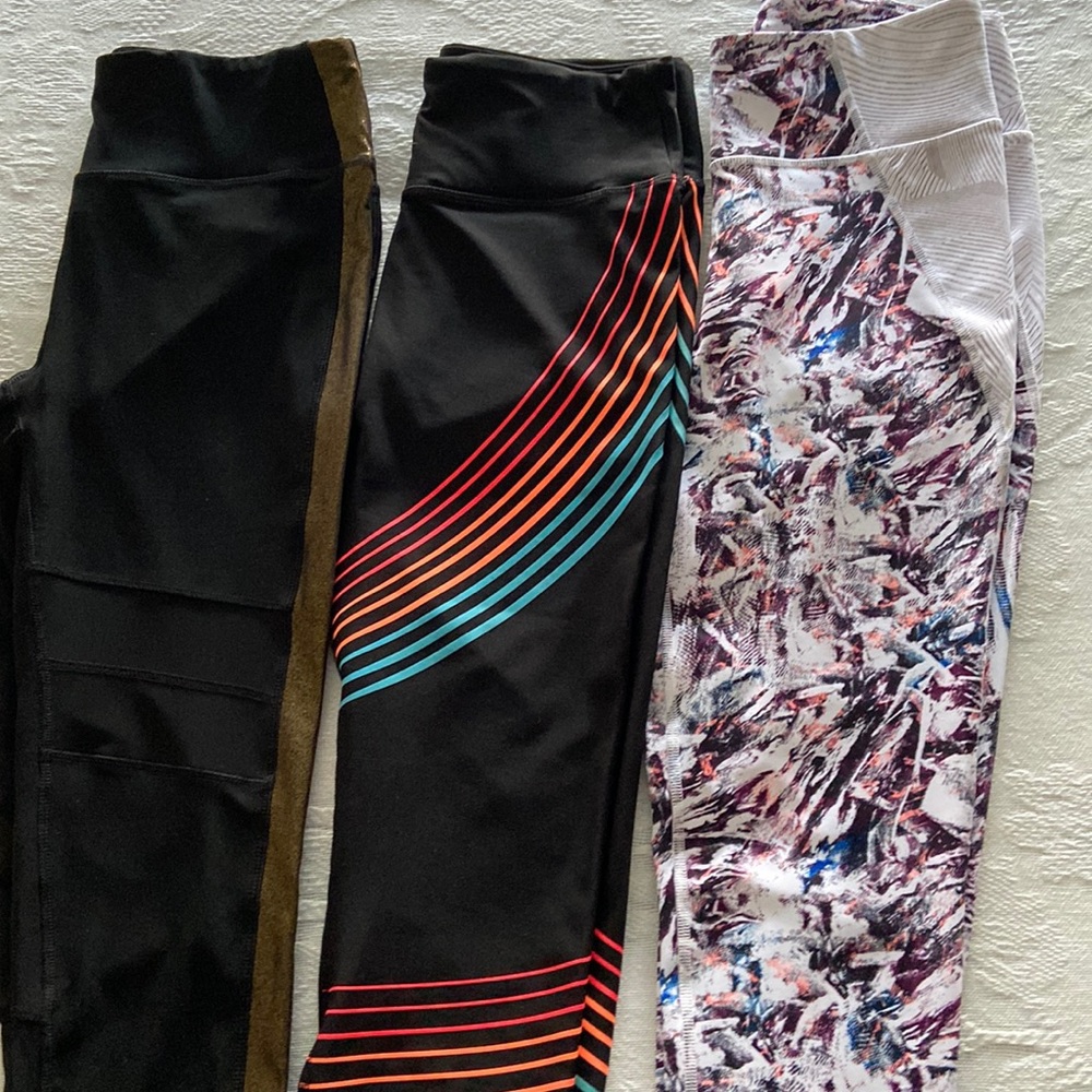 Workout bottoms. Blk w/gold trim - Blk w/ color both RBX. Multi FILA - All med